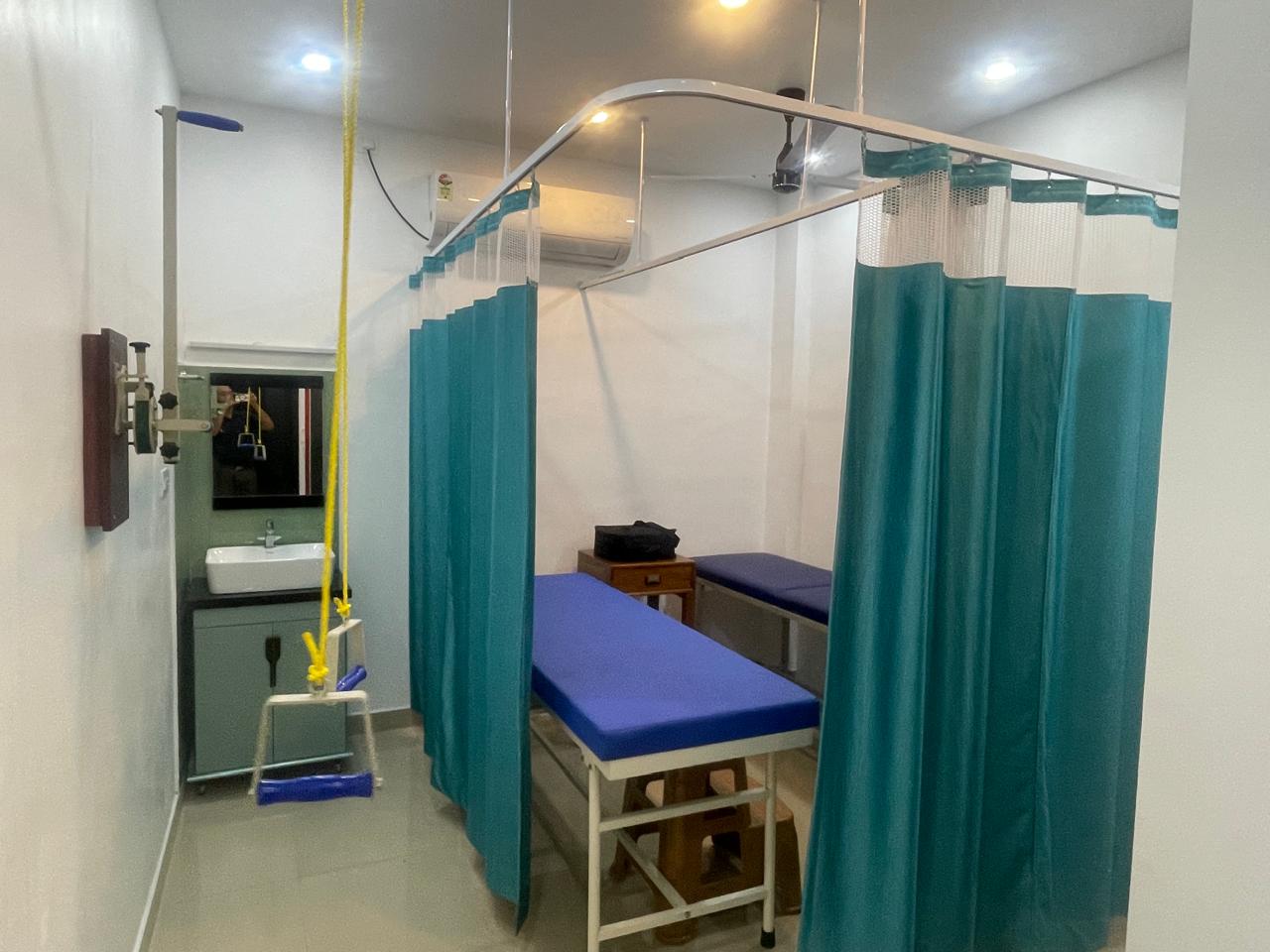 QDRC Physiotherapy treatment room with modern equipment in Kadungalloor, Aluva